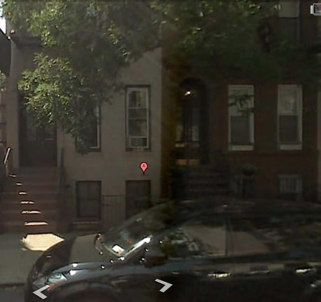302 E 82 St--single width brownstone townhouse